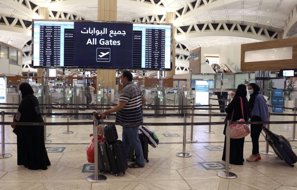 workers in airport saudi arabia